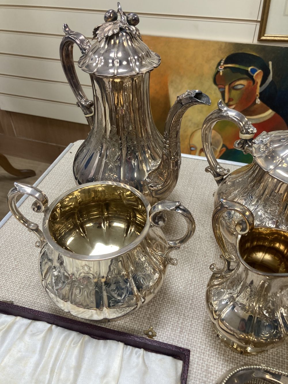 A Victorian silver plated four piece tea set, assorted plated flatware,etc.